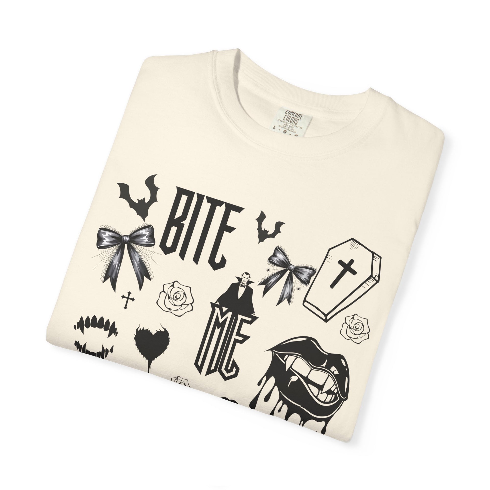 Sink your teeth into spooky season with this bold Bite Me vampire-inspired graphic tee! 🧛‍♂️🦇