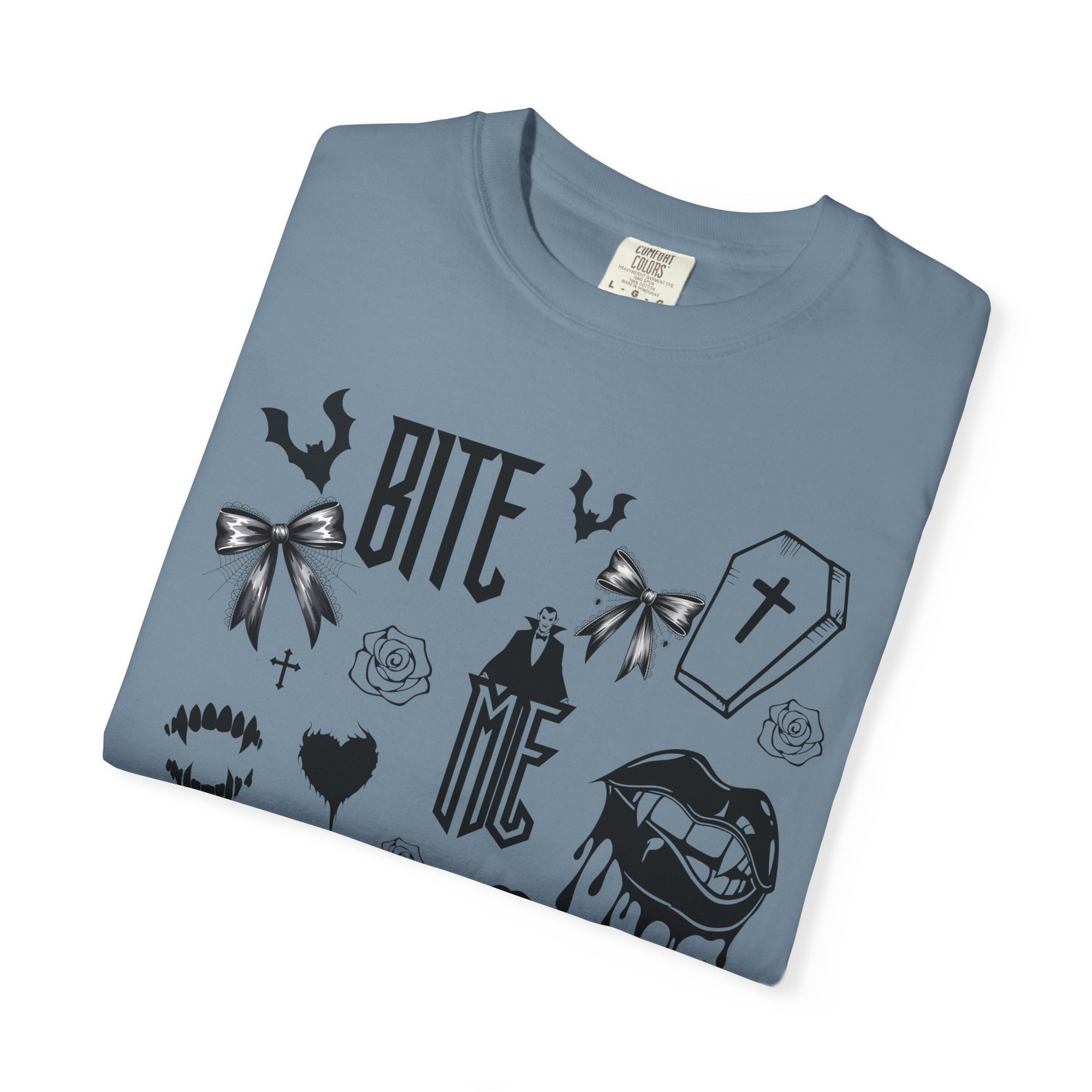 Sink your teeth into spooky season with this bold Bite Me vampire-inspired graphic tee! 🧛‍♂️🦇