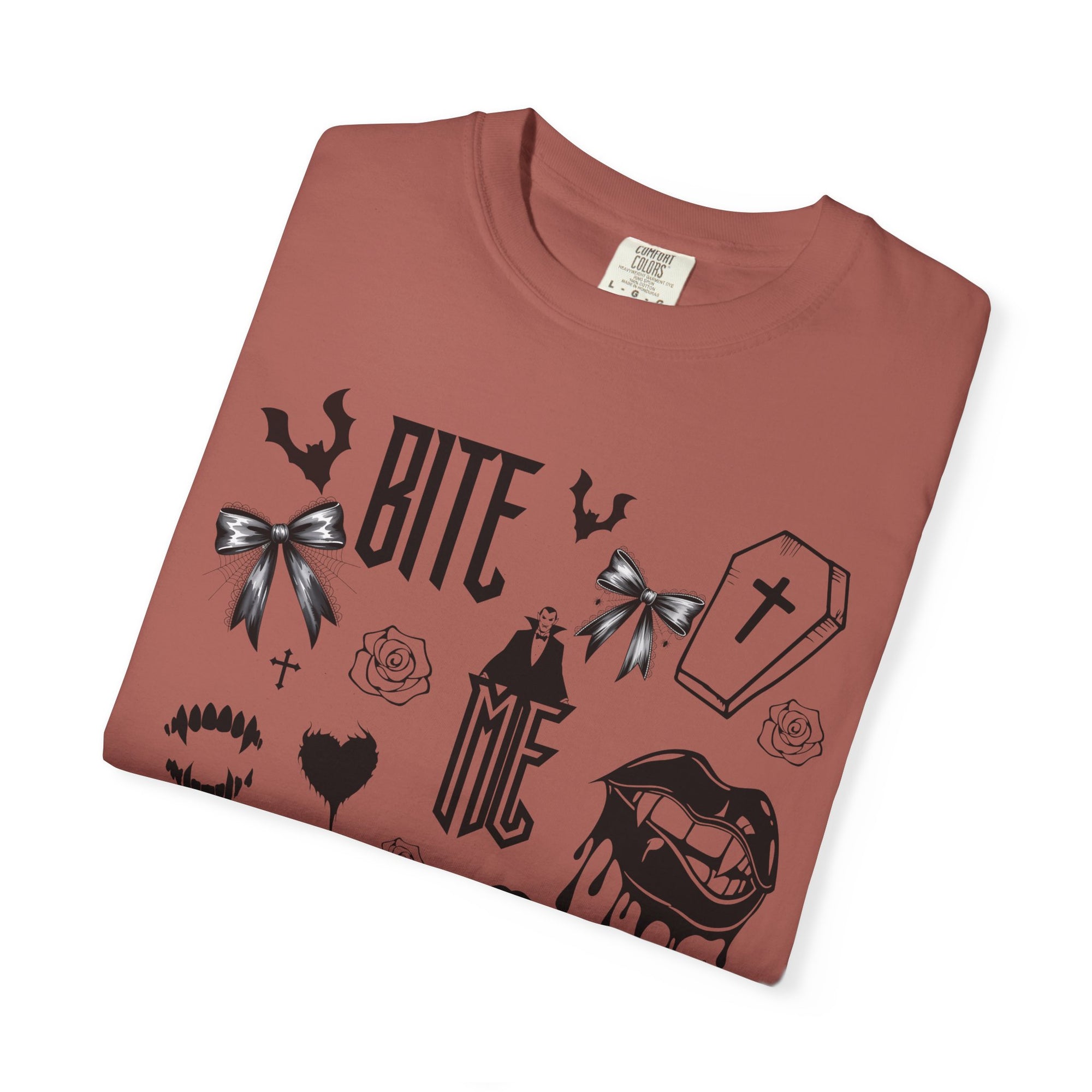 Sink your teeth into spooky season with this bold Bite Me vampire-inspired graphic tee! 🧛‍♂️🦇