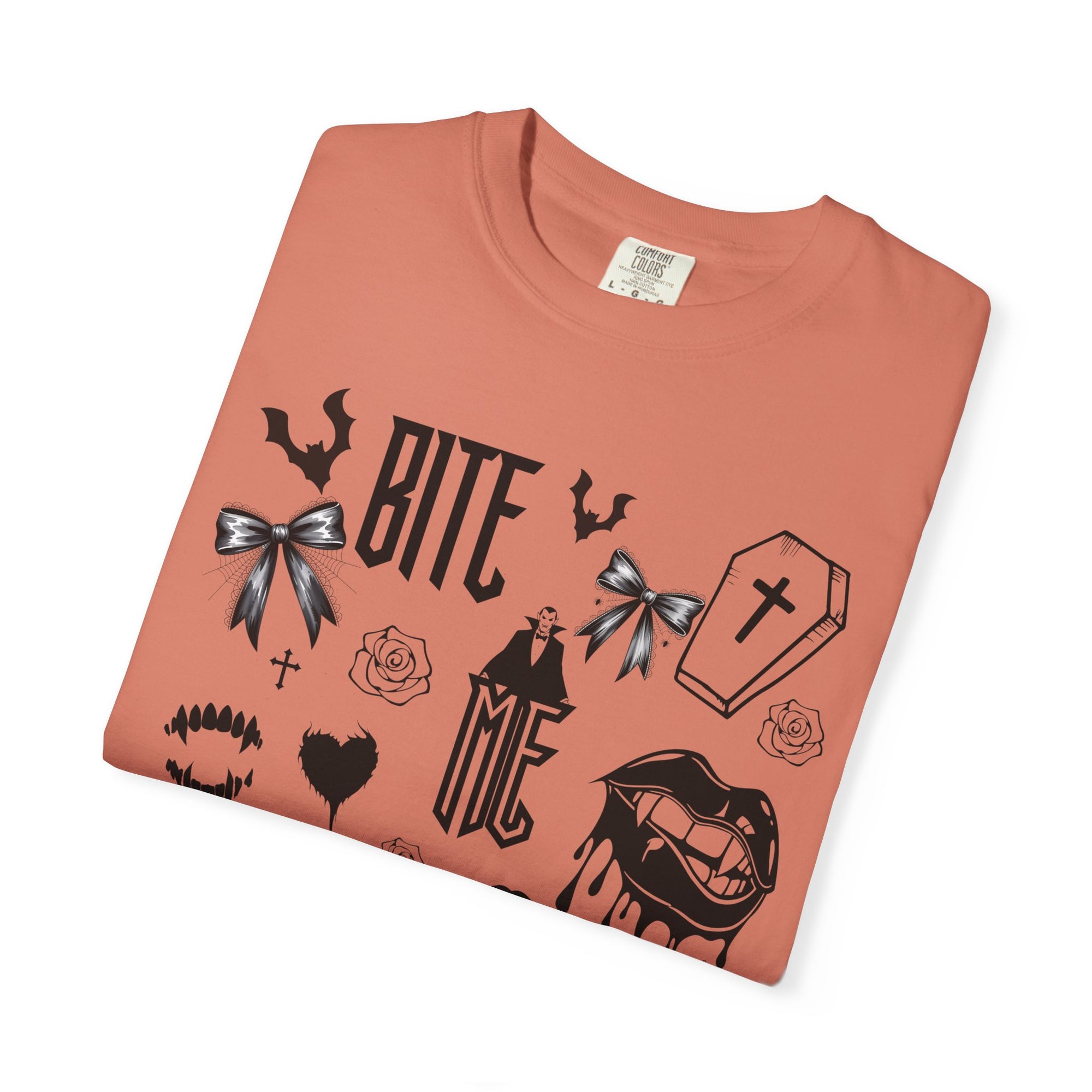 Sink your teeth into spooky season with this bold Bite Me vampire-inspired graphic tee! 🧛‍♂️🦇
